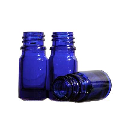 China 5ml 10ml 15ml 20ml 30ml 50ml 100ml Pharmaceutical Amber Blue Coalt Clear Green Essential Oil Glass Bottle With Clear Dropper Tamper CCT Cap for sale