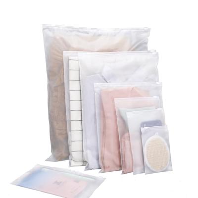 China Custom frosted frosted T-shirt bag waterproof ziplock zipper bags custom logo printed plastic zipper clothing packaging bags for sale