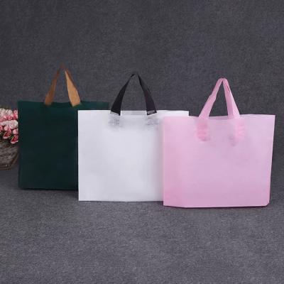 China Custom Printed Logo Design Handle Fashion Gift Plastic Bag Moisture Proof Clothing Packaging Bags Tote Punching Carry With Handle for sale