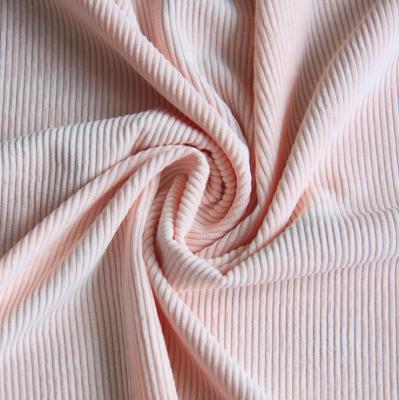 China New Trend Solid Color Polyester Fabric Polyester Spot Garment Flame Retardant High Stretch Fabric Durable 100% Polyester Corduroy Fabric for sale