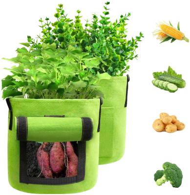 China 2021 Wholesale Environmental Protection Handle Garden Household Wool Felt Breathable Environmentally Friendly Nonwoven Flower Pot Planting Bag for sale