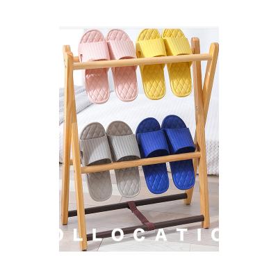 China Usb home sandals and slippers for men and women in the summer bathroom indoor non-slip soft bottom bath use couples plastic slippers for sale