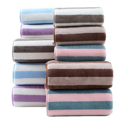 China New Solid Color Velvet Absorbent Towel Coral Striped Safe Non-shedding Bath Towel For Household Children for sale