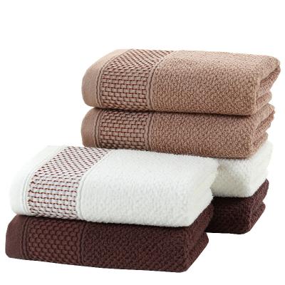 China New Modern Simple Thickened Household Soft Absorbent Jacquard Cotton Towel Cotton Plaid Towel Child Safe Solid Color for sale