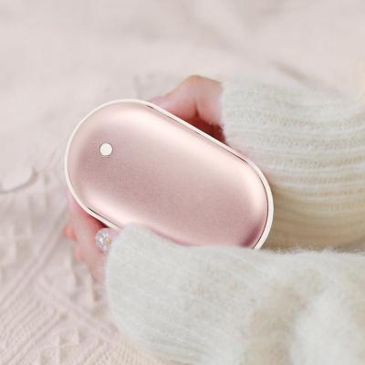 China Power Bank 2400mAh Hand Warmers Pocket Multifunctional Rechargeable Reusable Hand Warmers Portable Battery Charger for sale