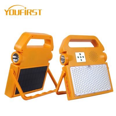 China 100w solar rechargeable led flood light outdoor camping multifunctional handheld emergency outdoor or indoor location for sale