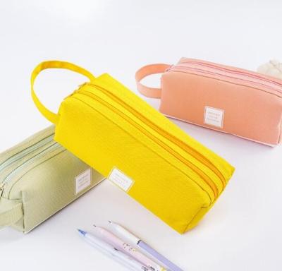 China Diary used new creative large capacity pencil case handle double layer school portable pencil case for sale