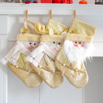 China Cloth Large gold Gift Bag Christmas Santa Sacks with White Fluffy Pom Poms Drawstring Gift Sacks Xmas Decor Bulk Christmas Stockings for sale