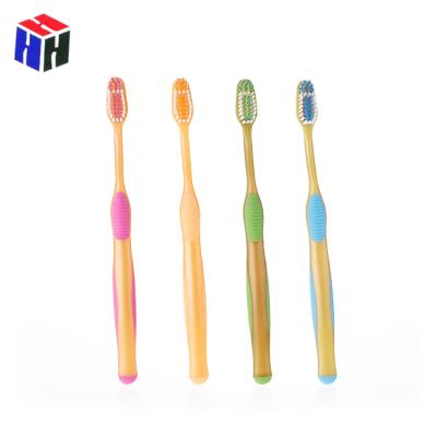 China Hand Grip Adult Plastic Toothbrush With Soft Rubber Grid for sale