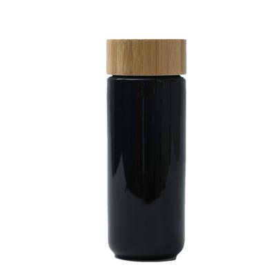 China Sustainable Hot Sales Double Wall Travel Ceramic Water Bottle With Bamboo Lid for sale