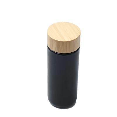 China Viable natural bamboo cover ceramic inner water bottles wholesale for sale