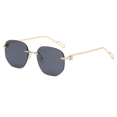 China Fashion Sunglasses 2021 Rimless Sunglasses Women New Fashion Metal Polarized Shades Unisex Sunglasses for sale