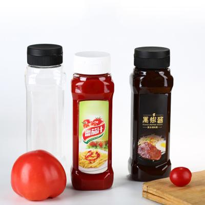 China Plastic Soft Drink Jam Jar Ketchup Sushi Extrusion Bottle 410ml Silicone Valve Salad Squeeze Bottle for sale