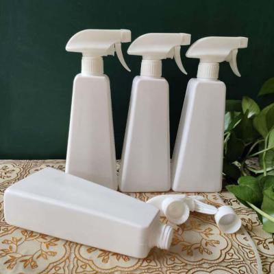 China Plastic Trapezoidal Spray Bottle Dilution 500ml Household Products PE Bottle Cleaner Spray Gardening Bottle Available for sale