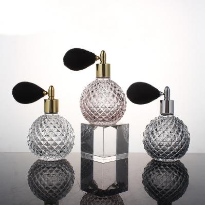 China Personal Care Vintage 100ml Luxury Style Ball Shaped Light Vapor Perfume Atomizer Spray Glass Refillable Bottle for sale