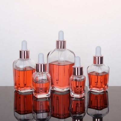 China Personal Care 10ml 20ml 30ml 50ml 100ml Clear Silver Cosmetic Oil Serum Dropper Glass Dropper Bottle With Dropper for sale