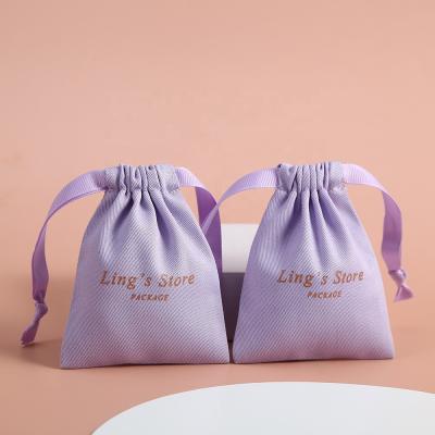 China 8*10 cm Cotton Canvas Drawstring Pouch Soft and High Quality Medium Light Purple Jewelry Gift Packaging Bags for sale