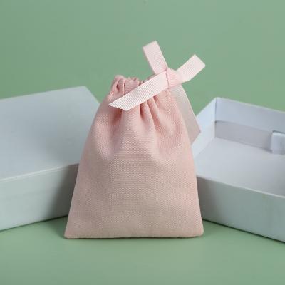 China 8*10cm Cotton Canvas Drawstring Pouch Soft And High Quality Soft Pink Medium Jewelry Gift Packaging Bags for sale