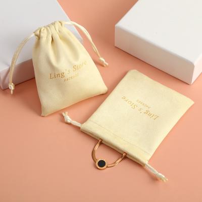 China Soft and high quality hot sale flannel jewelry pouch bag 12x16cm custom jewelry bags jewelry bags with logo for sale