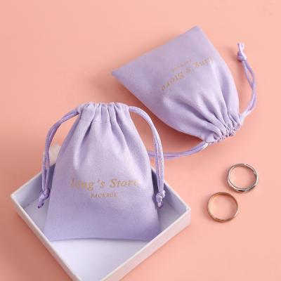 China Custom 13x18cm purple flannel velvet jewelry pouch soft and high quality jewelry pouch bag with logo for sale