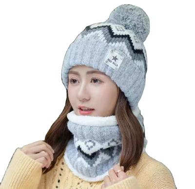 China 2021 Media Winter Medium Hat Big Warm Knitted Fur Ball Knitted Hats Scarf Set Women Beanie Hat Thick Female Cap for sale