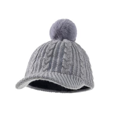 China Barred 2021 winter kids knitted baseball cap hat with pompom plain color kids knitting winter hat for sale