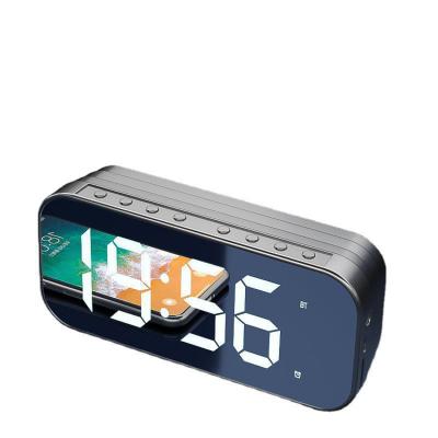 China 2021 Clock Radio Loud Speaker Mobile Phone Audio With Time Display Clock Portable Mini Woofer Wireless Speaker Under for sale