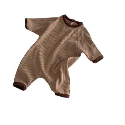 China New Design 95% Cotton Spring Outfit Solid Full Body Baby Girl Clothes With Pocket OEM Welcomed Waffle Romper for sale