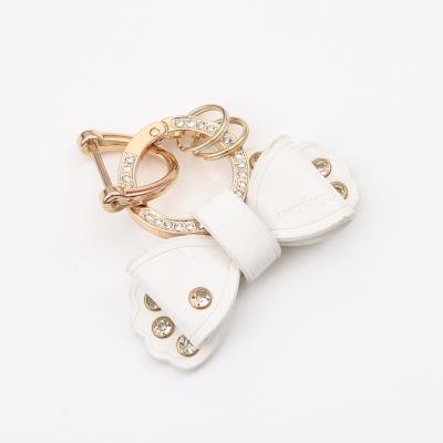 China Wholesale High Quality Fashion Souvenir Gift Leather Key Chain Bow With Diamond Key Ring For Girls Gifts for sale