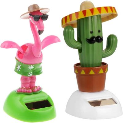 China ABS 2pcs Solar Powered Car Toy Animal Solar Powered Dancing Dolls Dancing Cactus Crane Home Car Ornament Kids Toys Gifts for sale