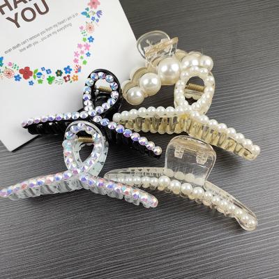 China Fashion New Arrival Fashion Pearl Bath Hair Claw Accessories Shark Acrylic Hair Claw For Girls for sale