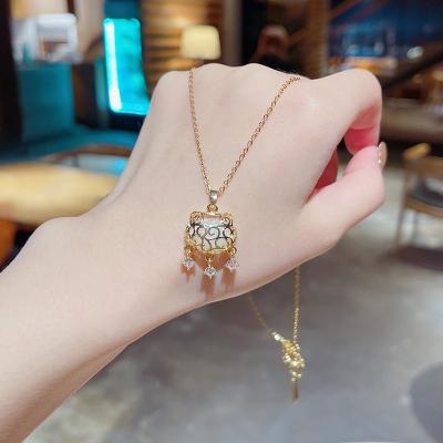 China Retro Ping An Long Life Lock High Quality Auspicious Gold Plating True Gold Titanium Steel Crystal Necklace For Holiday Gift for sale