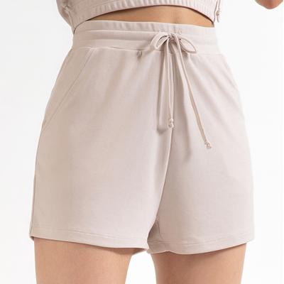 China Custom Anti-Wrinkle Women With Pockets Drawstring Cotton Yoga Shorts Workout Gym Sporty Shorts for sale