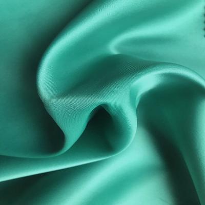 China 2019 best selling SATIN polyester spandex flame retardant fabric for dress or pants for sale