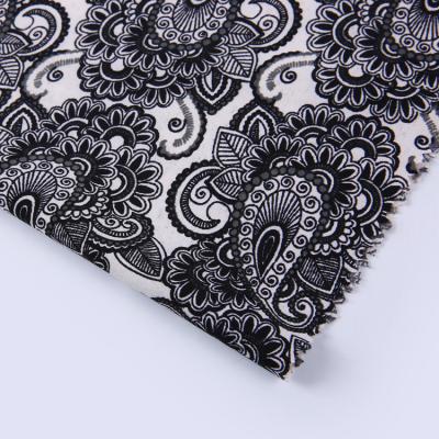 China Special Design Anti-Static Black And White Stretch 90%polyester10%spandex African Paper Print Fabric for sale