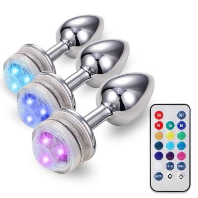 China Real Touch Feeling Bdsm LED Anal Plug Toys Wireless Remote Control Butt Plug Metal Wire Glow Dilator Bdsm Anal Toys For Women Man for sale