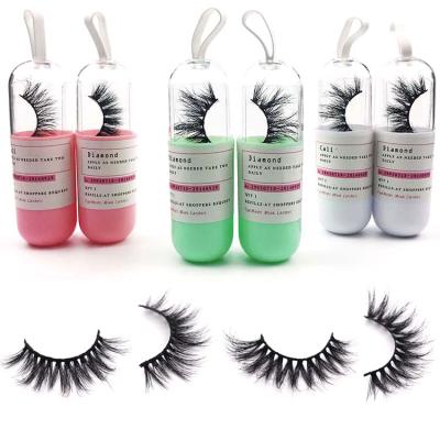 China 25mm mink eyelashes wholesale fluffy private label 25mm mink eyelash 3d strip full lashes seller pill bottle eyelash packaging 25mm luxury eyelashes for sale