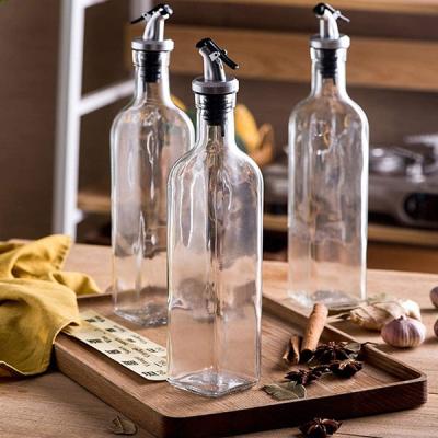 China Food Cheap Price 100ml 250ml 500ml 750ml 1L Clear Square Olive Oil Glass Bottle With Lid for sale