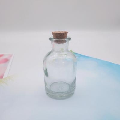 China Recyclable Empty Hotsales 50ml Round Clear Tubular Shape Aromatherapy Glass Diffuser Bottle for sale