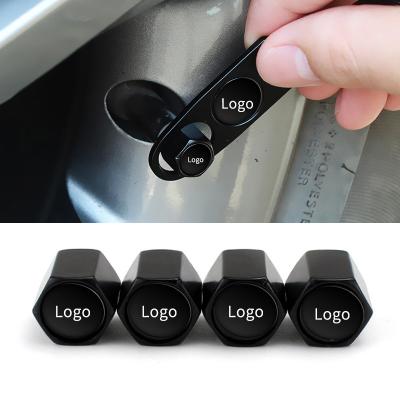 China Custom Single Fashion Copper Material Anti Theft Car Tire Valve Covers With Buckle Wrench for sale