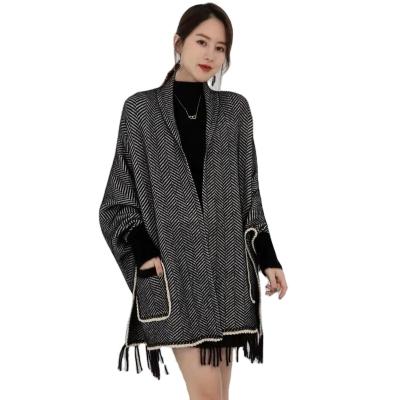 China New Wool Pocket Small Lattice Tassel Winter Luxury Striped Scarf Warm Women Poncho Shawl Coat for sale