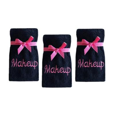 China Black Compressed Pure Cotton With Rose Embroidery Remove Makeup And Cleanse Embroidered Towel for sale