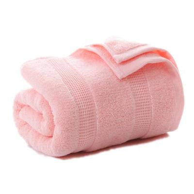 China Large Solid Color Stripe Jacquard Good Quality Compressed Cotton Bath Towel for sale