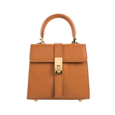 China 2022 Fashion Fashion Cross Pattern Ladies Handbags Stylish Creative Design Vegan Leather Pure Color Women Bags for sale