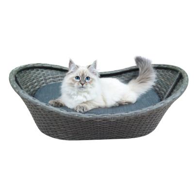 China Wicker Basket Dog Bed Brown Bath Tub Plastic Rattan Woven Cat Bed House Wooden Foot Pet Pet Cage for sale