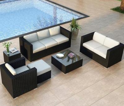 China Muebles de jardín de exterior 4pcs Conjunto Patio Sofá de jardín de ratán Sofá de esquina tejido con mesa y silla en venta