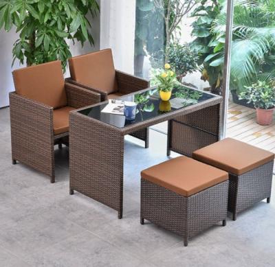 China Muebles de 5 piezas de Rattan de Pe Mesas de comedor y sillas de aluminio impermeable exterior Patio Salón al aire libre en venta