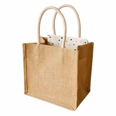 China Eco-friendly Wholesale Foldable Jute Burlap Shopping Bag With Custom Shopping Jute Bag for sale