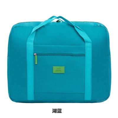 China Foldable Waterproof Collapsible Sports Bag Fitness Clothes Organizer Travel Bag Large Capacity Clothes Storage Hand Travel Bag for sale