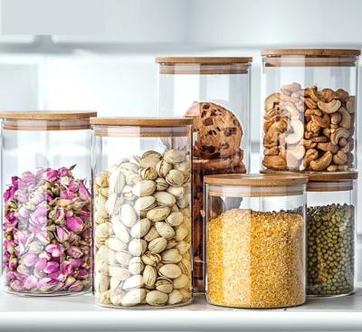 China RELEA Air tight candy storage glass jar with a natural bamboo lids for sale